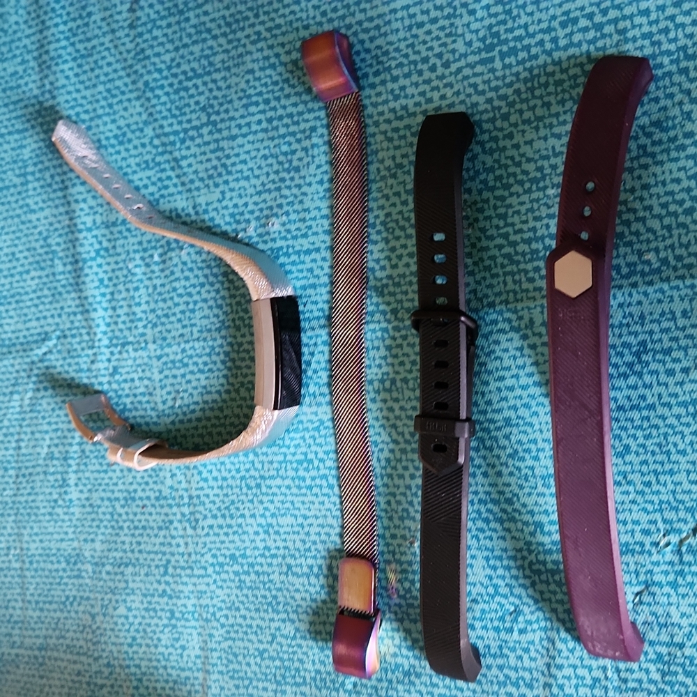 Used Fitbit, and 3 extra wristbands, for parts